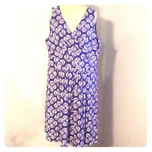 Pretty sleeveless V neck fit and flare dress.